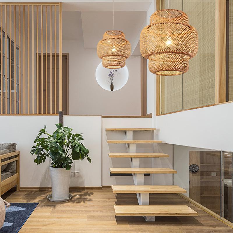 Aureon bamboo cylinder pendant light hanging in a modern living room interior