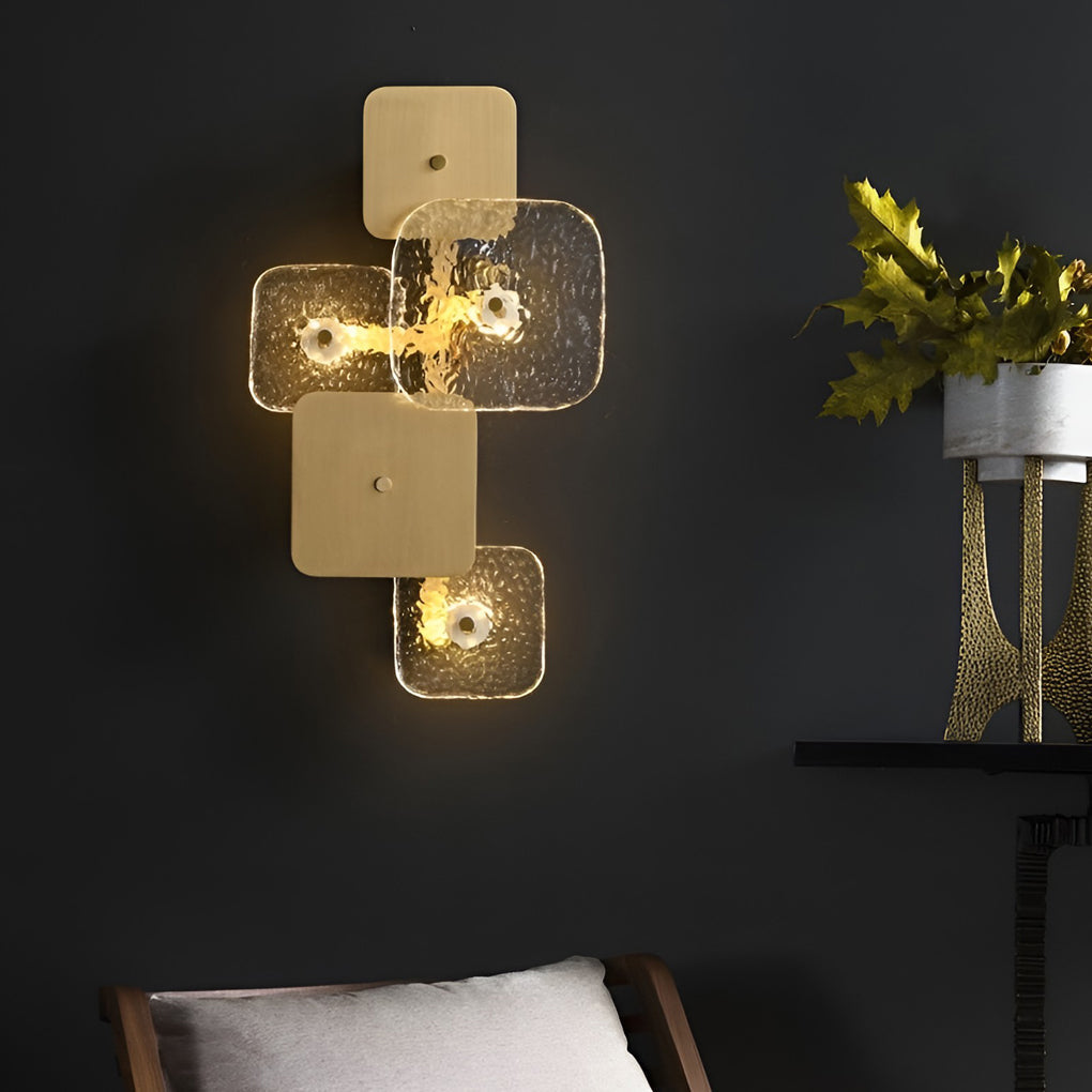 Alure LED wall sconce illuminated, warm ambient light in a bedroom