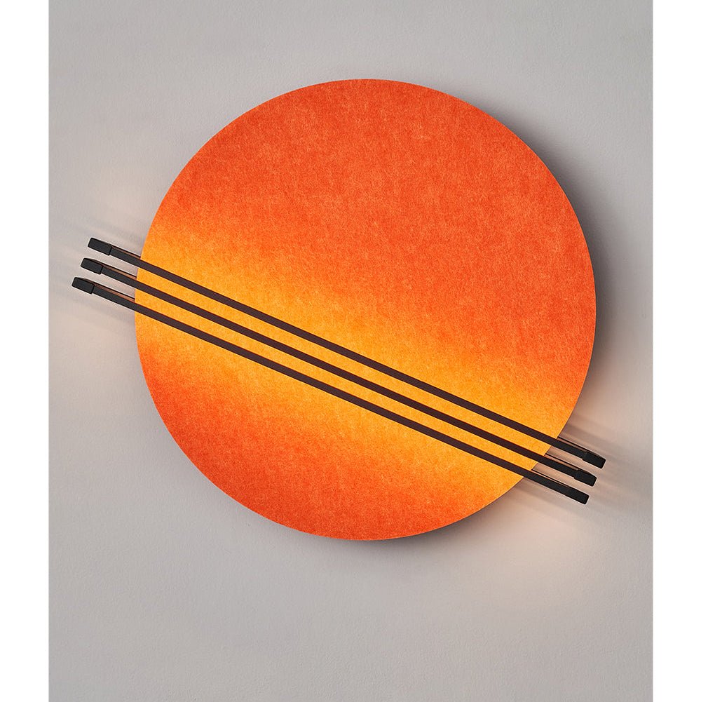 Overhead shot of the Vantara circular felt wall sconce showing the full 60 cm disc diameter and felt texture
