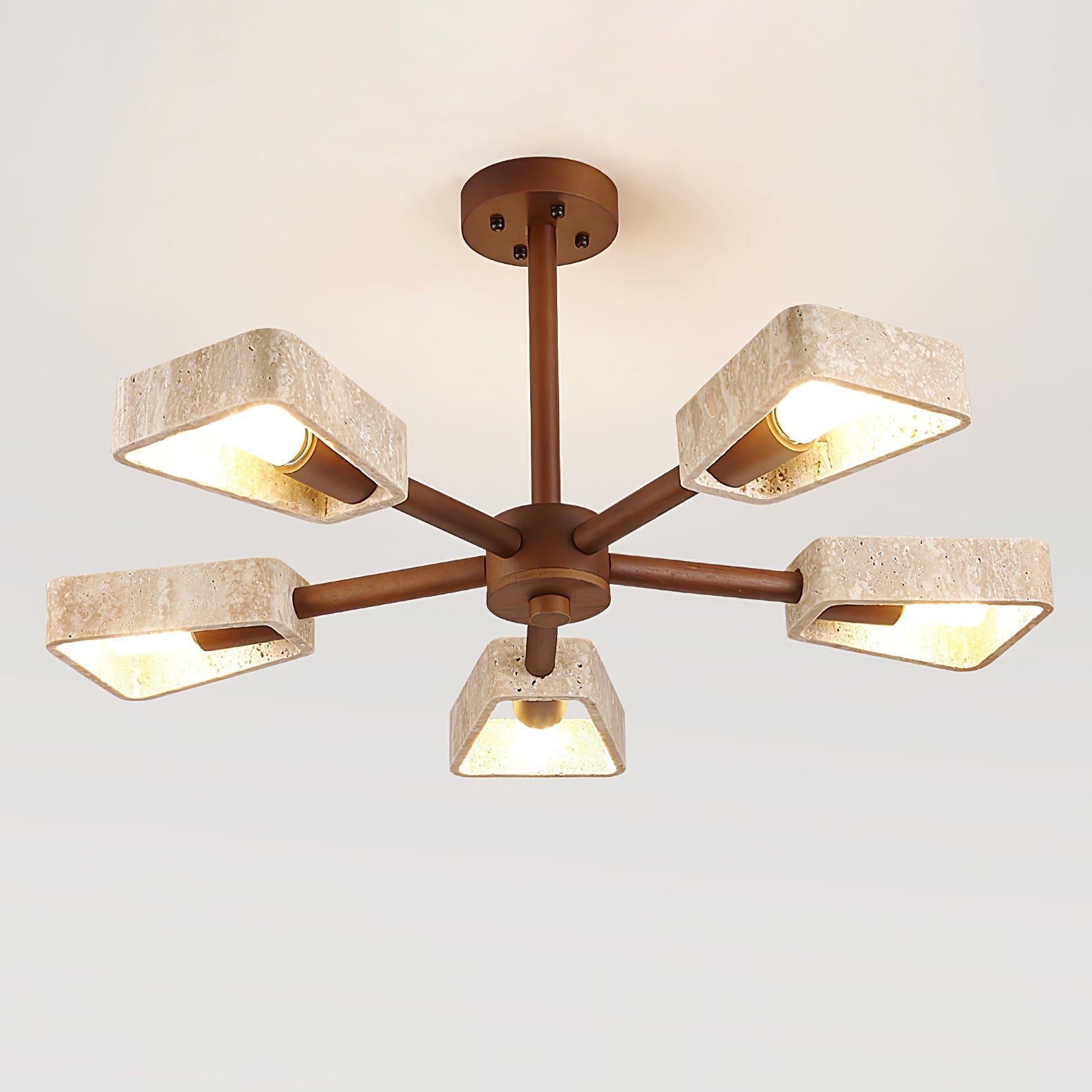 Minimal stone chandelier with solid wood arms in a considered, calm interior setting