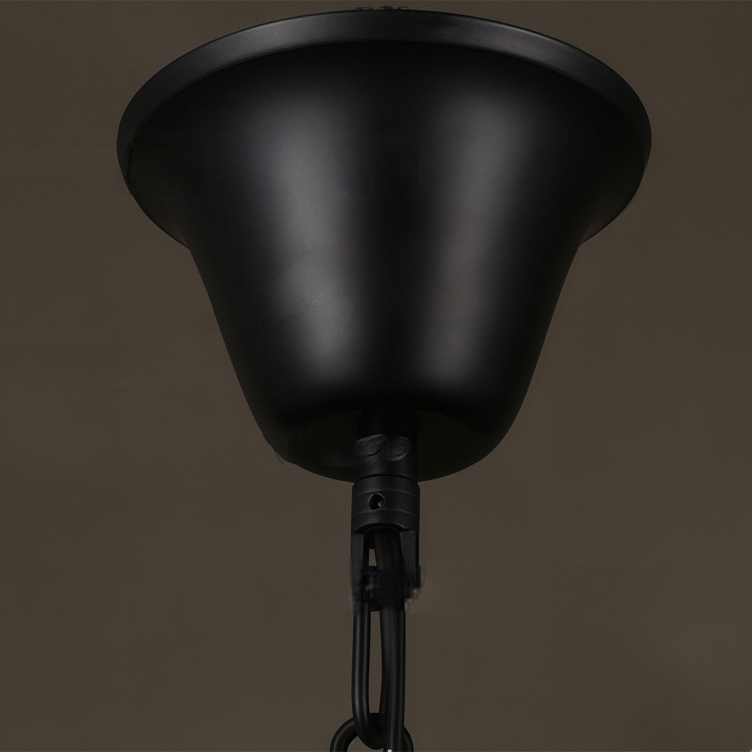 Aureon pendant light, underside view showing clear glass bowl and black iron detail