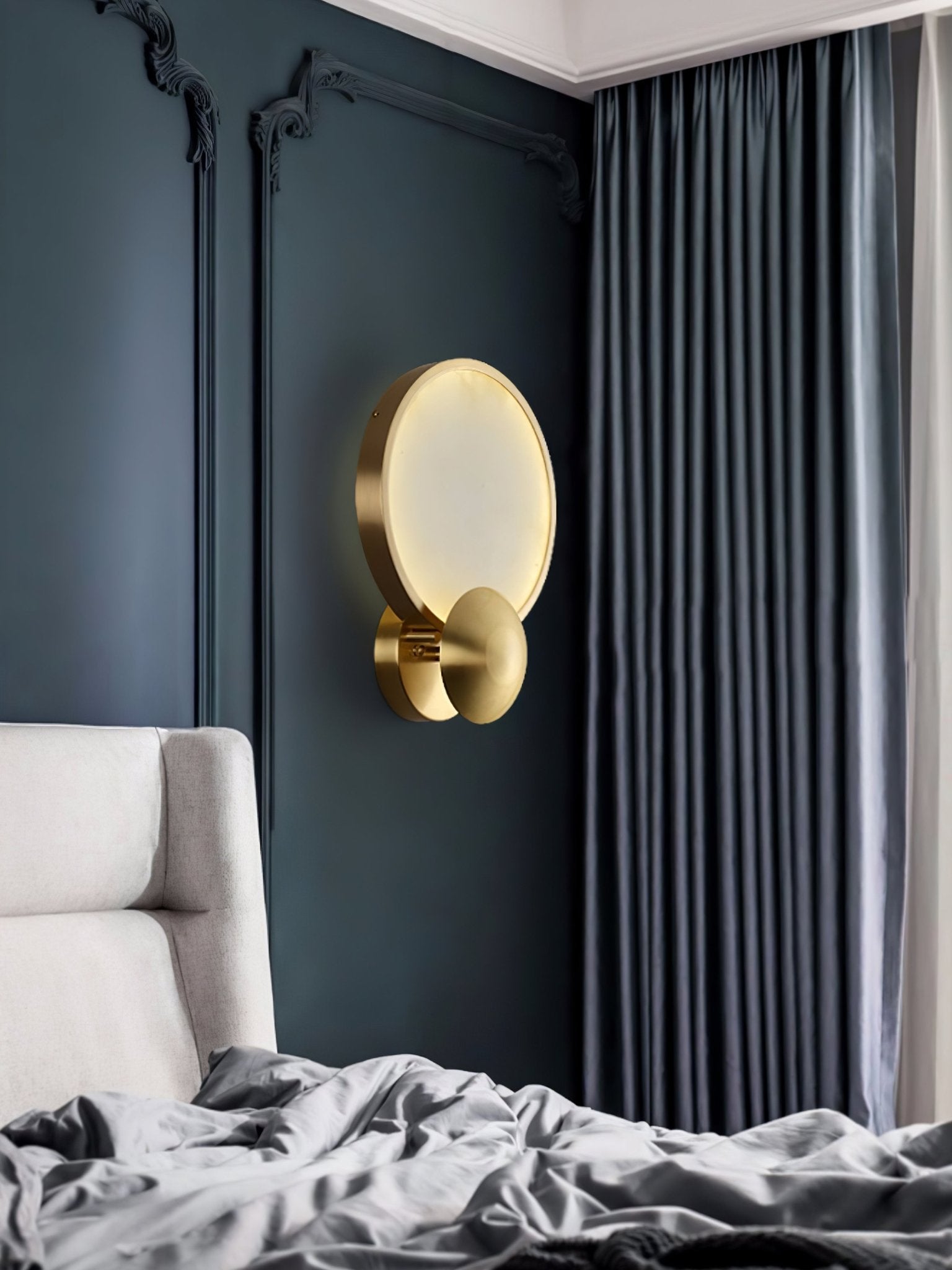 Sayo wall light mounted in a living room alongside neutral textures and soft furnishings