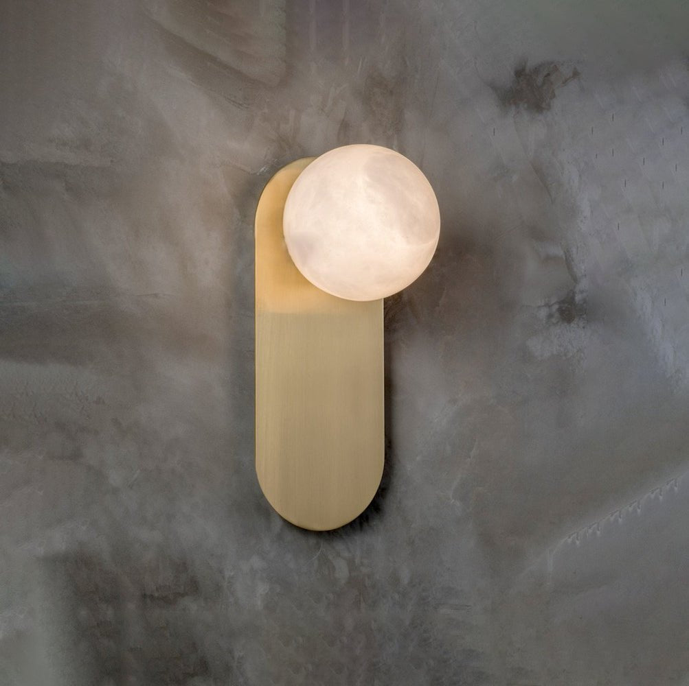 Savio Savio Wall Light styled in a calm, neutral bedroom setting