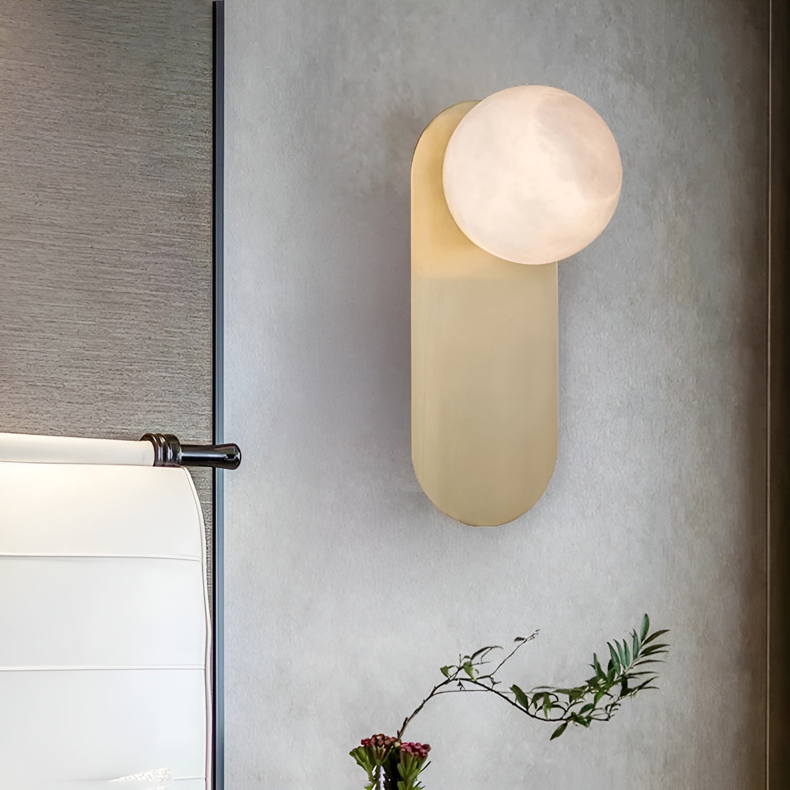 Overhead view of the Savio Savio Wall Light showing circular shade form