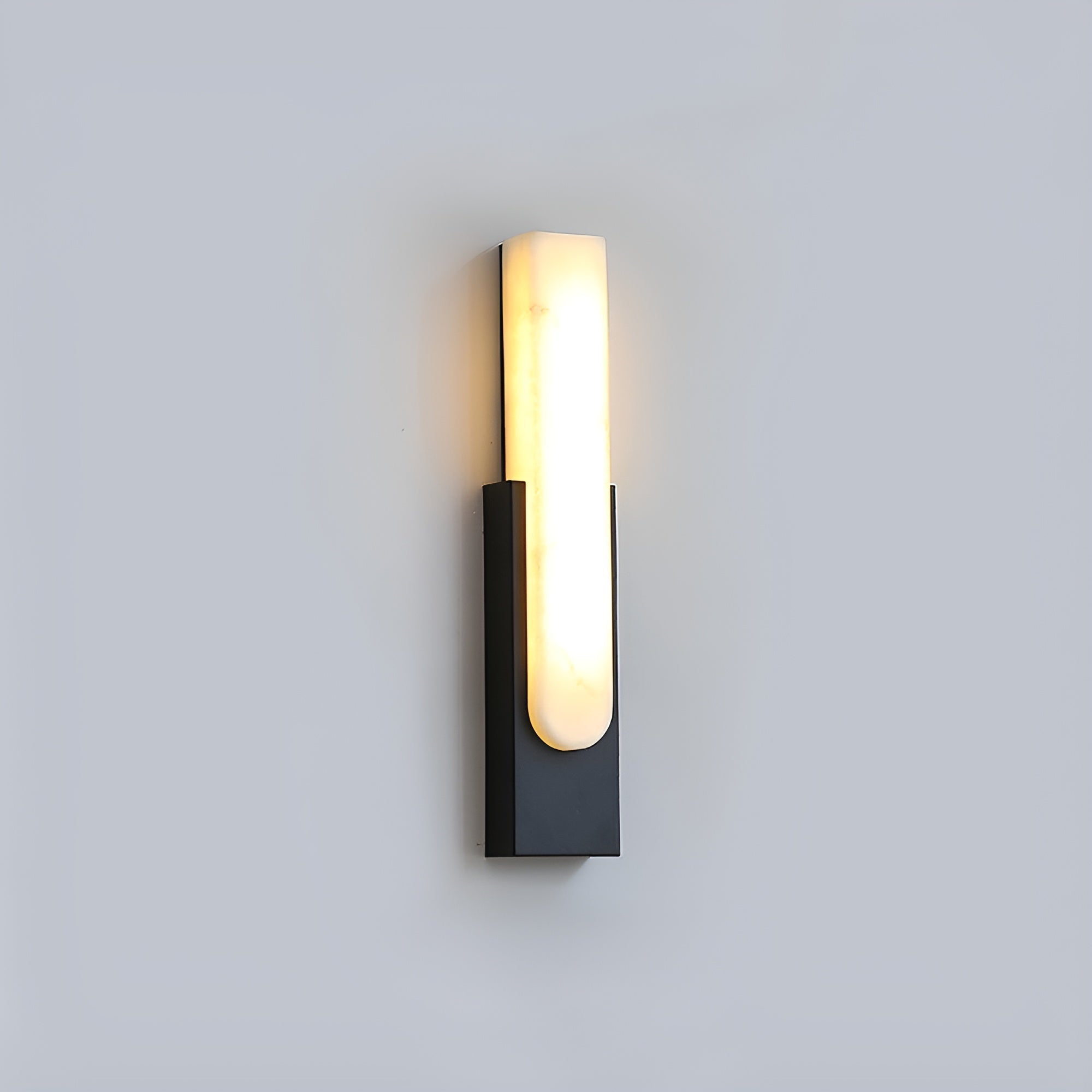 Close-up of natural Iwara shade on the Iwara Wall Light showing stone veining and translucency