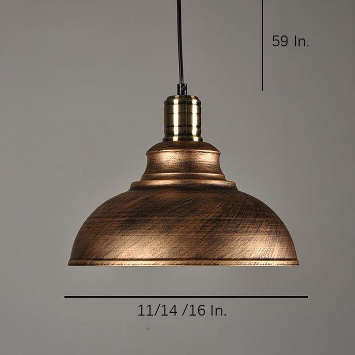 Aureon dome pendant light in black, 16-inch shade, styled above a kitchen island in a contemporary interior