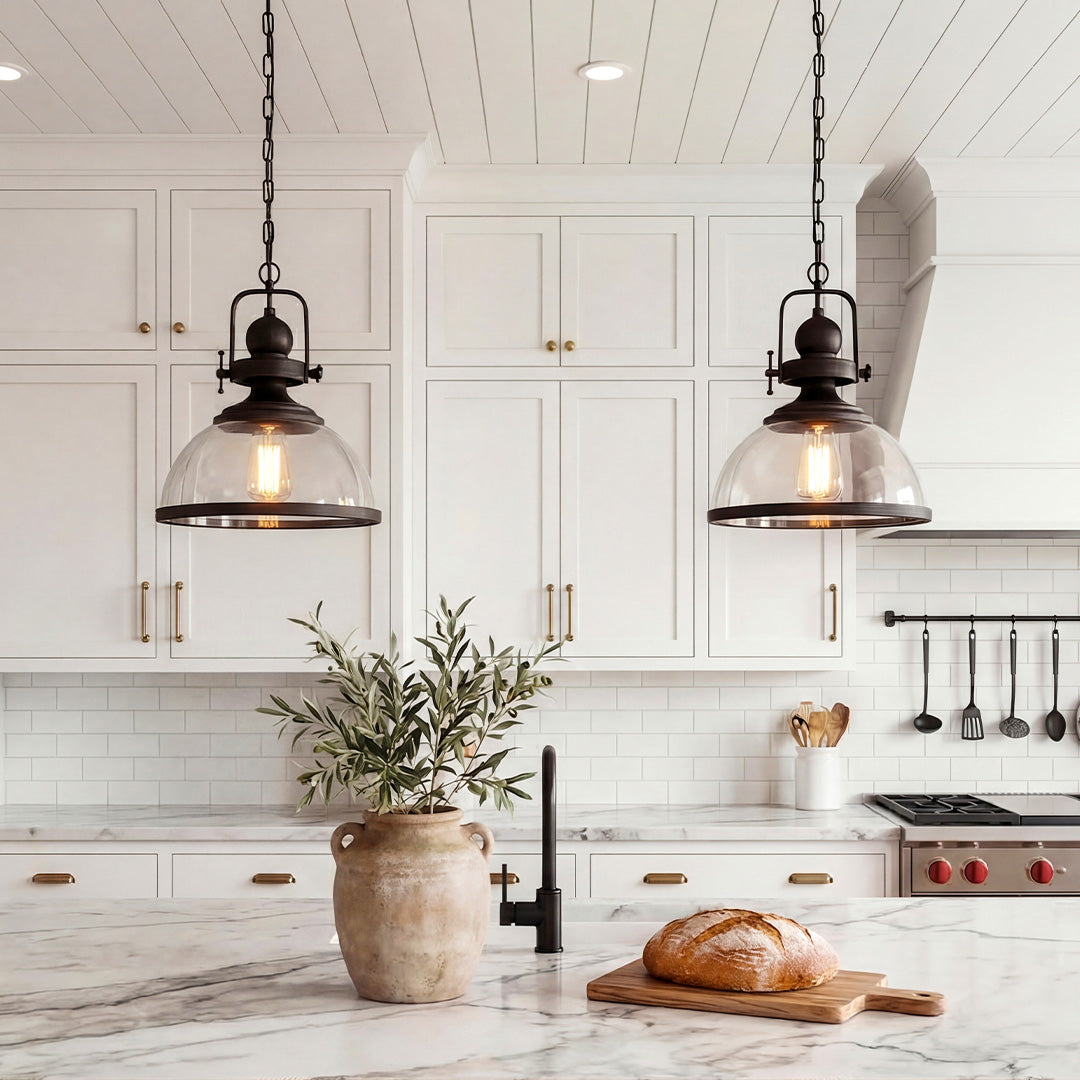 Aureon industrial glass pendant light, close-up of clear glass shade and black iron hardware