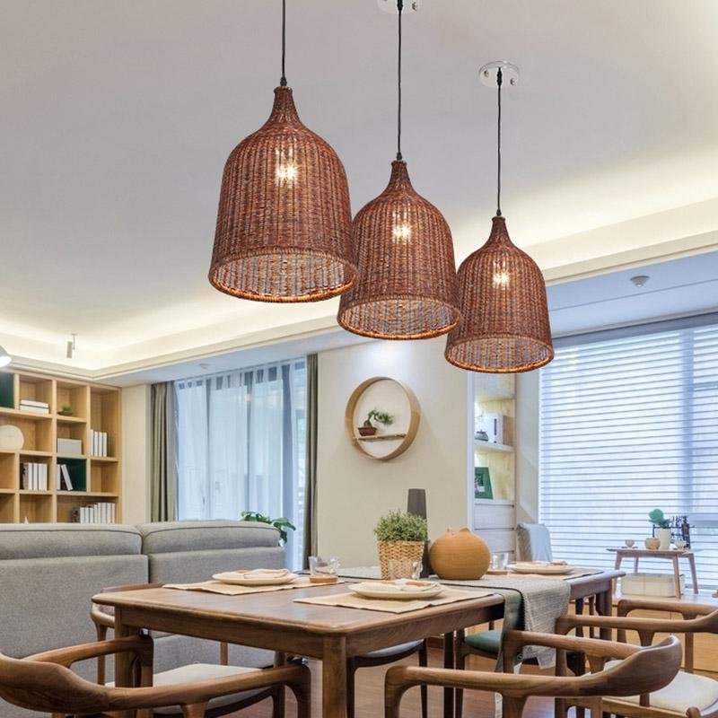 Aureon rattan pendant light side profile showing bell-shaped woven shade and cord suspension