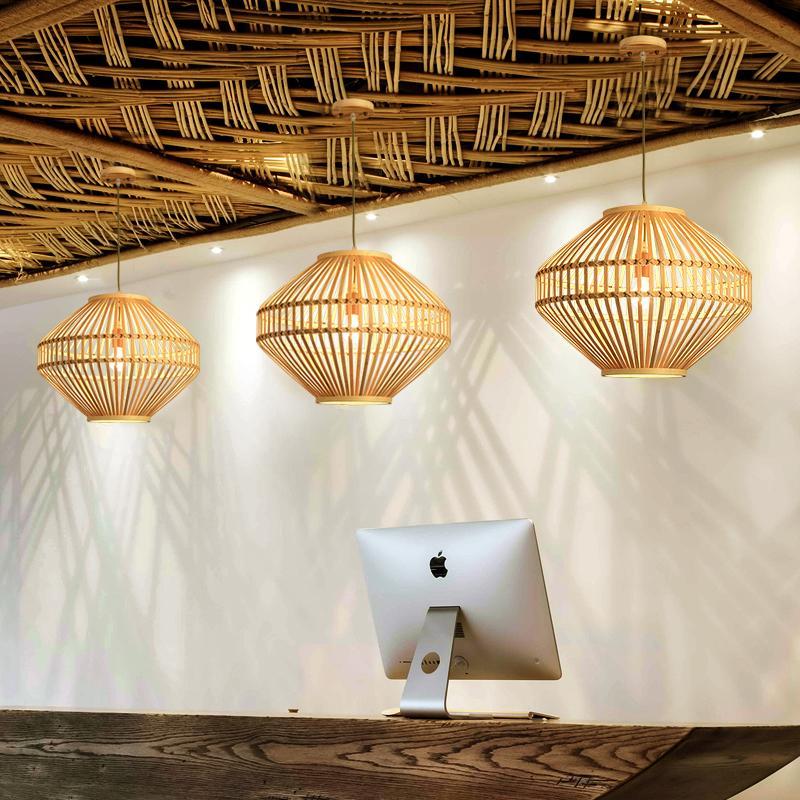Close-up of Aureon bamboo pendant light woven shade detail showing natural bamboo construction