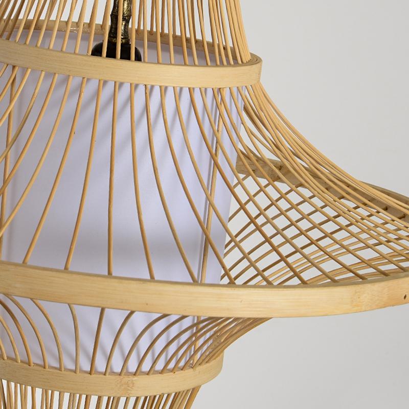 Bamboo pendant light hanging in a living room, natural material ceiling light detail