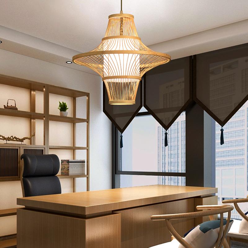 Natural bamboo pendant light in a warm-toned dining room, organic modern interior styling