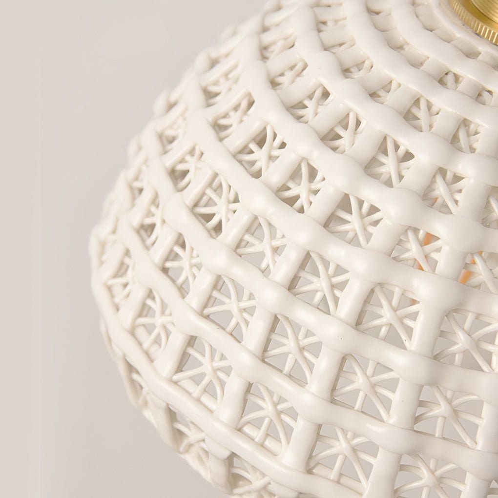 Aureon single-light ceramic pendant in blue shade, warm white glow, modern minimalist interior