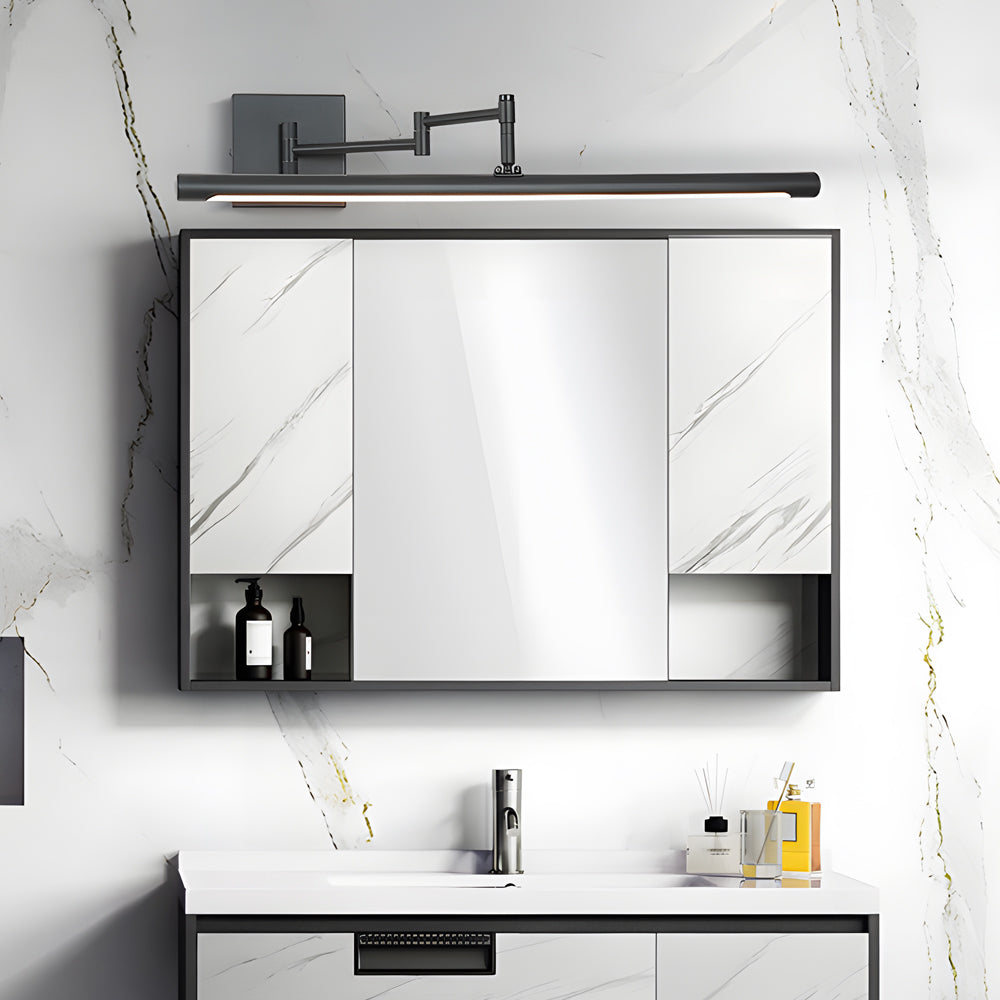 Viora black bar vanity light mounted above a bathroom mirror in a modern interior