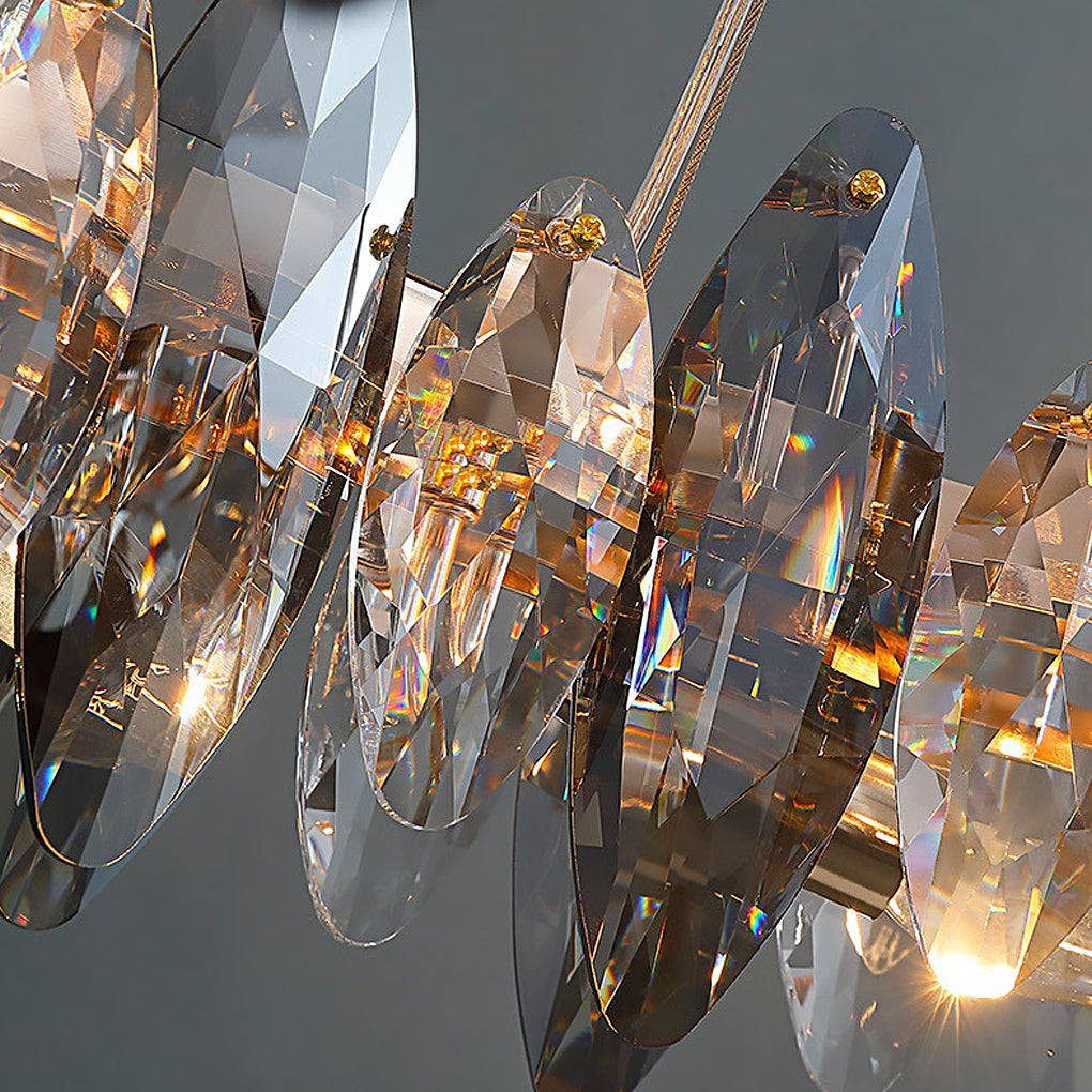 Close-up of crystal chandelier shades showing light reflection and smoke grey glass finish