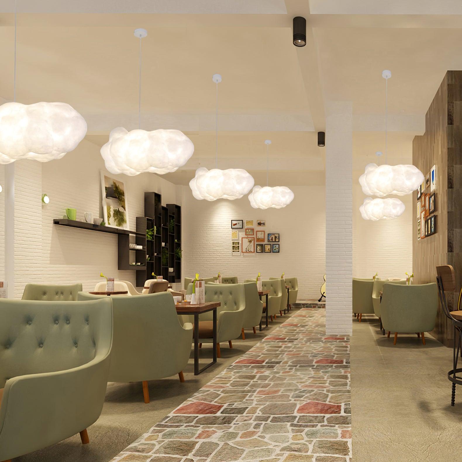 Aureon cloud pendant light in a modern café setting with warm ambient glow
