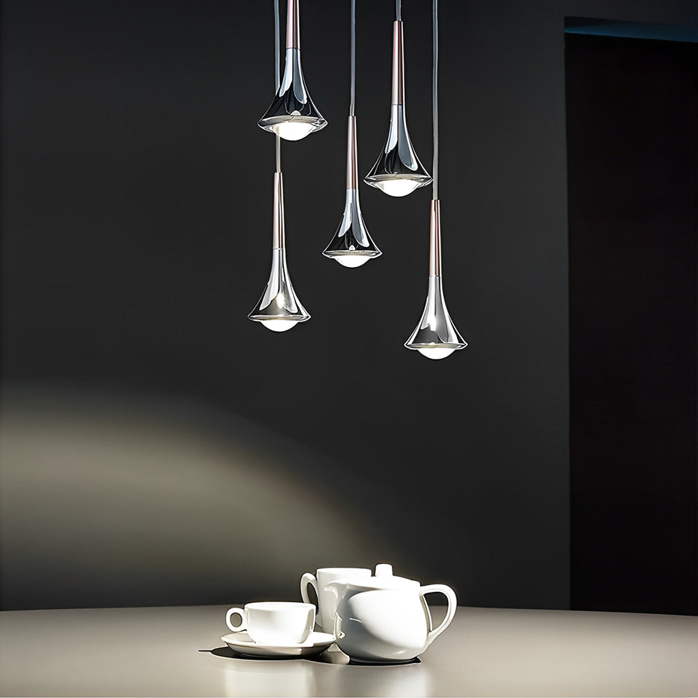 Aureon mini pendant light used as accent lighting above a reading nook or side table