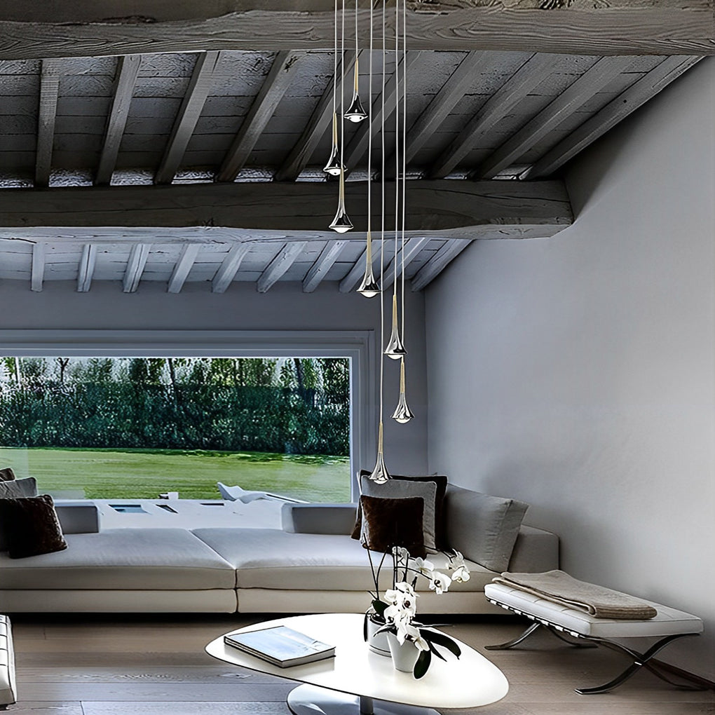 Aureon teardrop pendant lights in an open-plan modern living space, warm ambient lighting