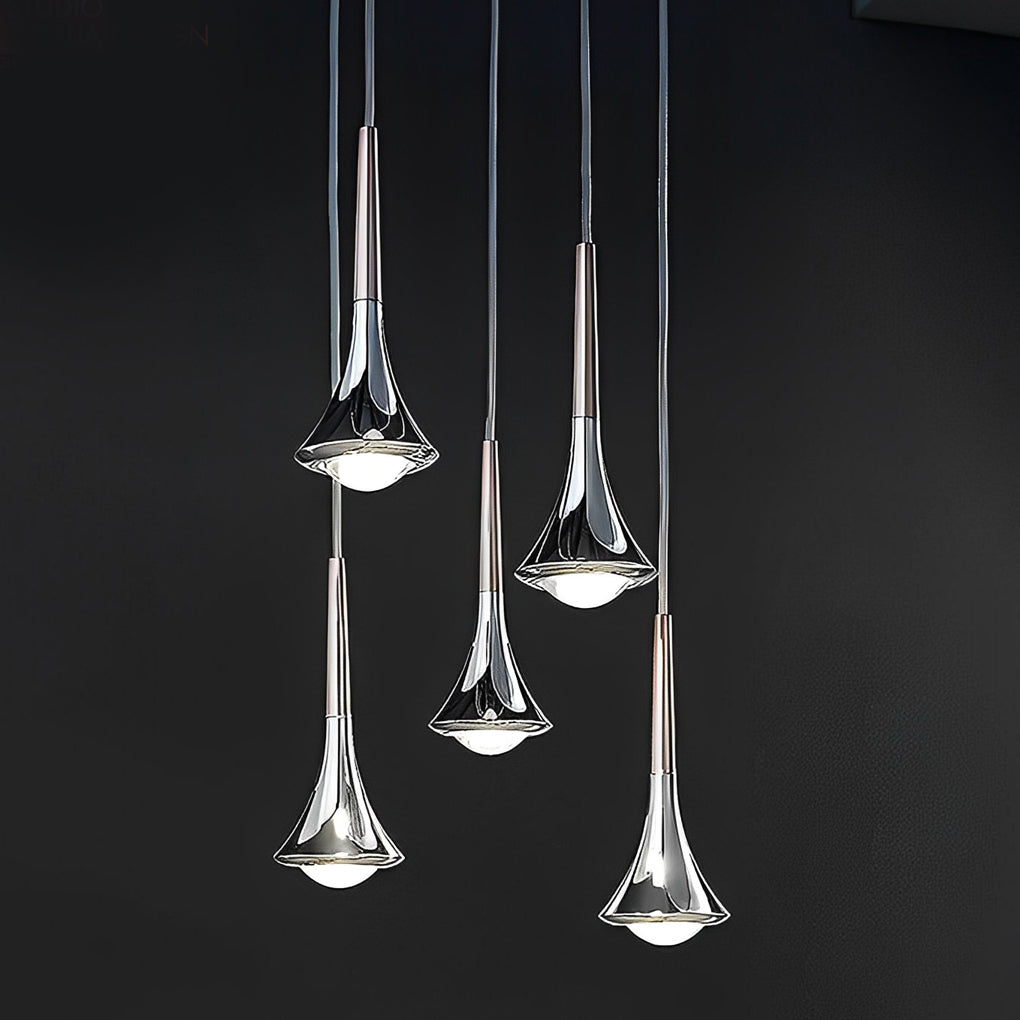 Vertical cluster of Aureon teardrop pendant lights at staggered heights in a contemporary interior