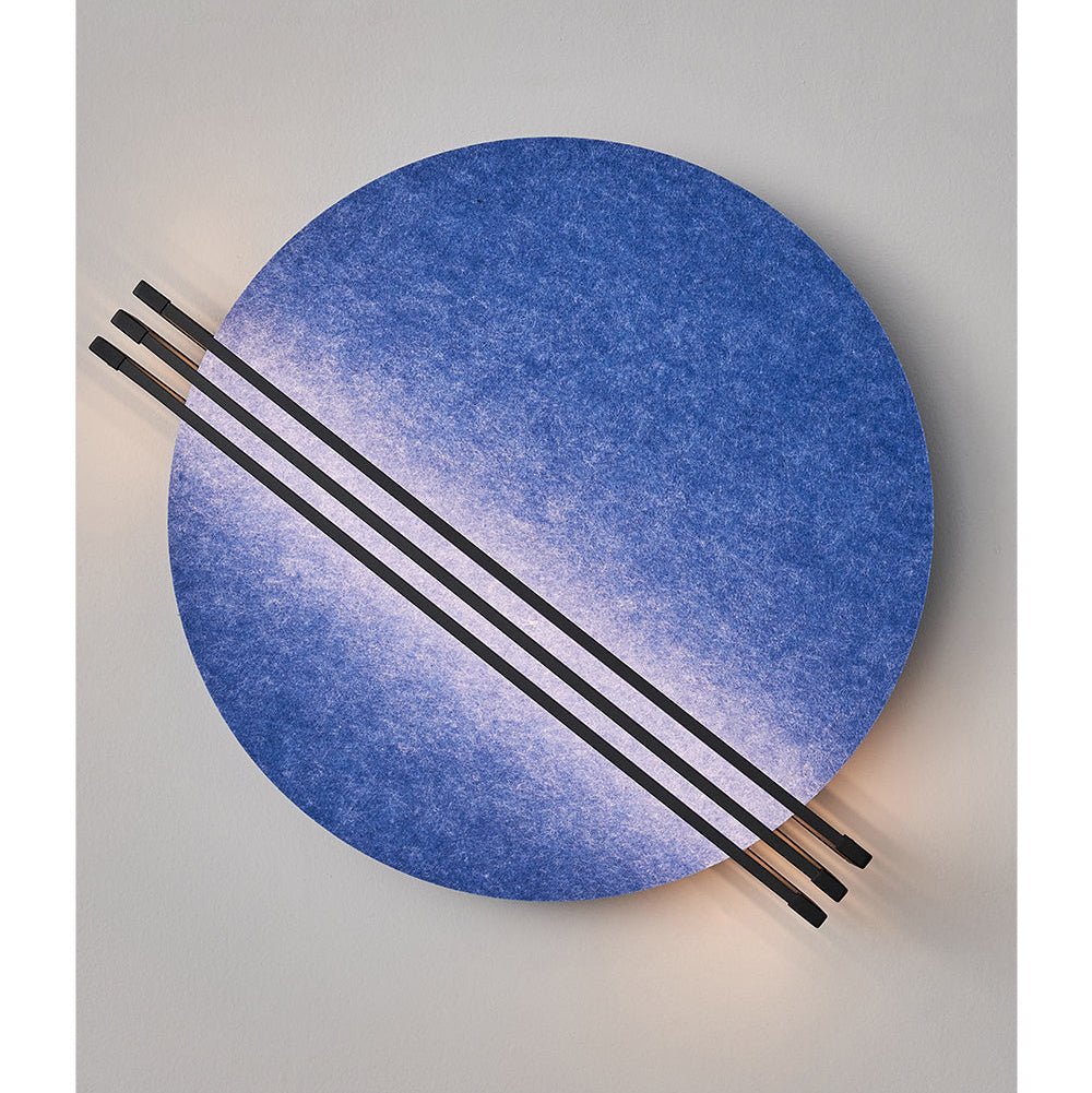 Vantara felt wall sconce showing the graphic contrast of black metal rods against the fabric disc shade