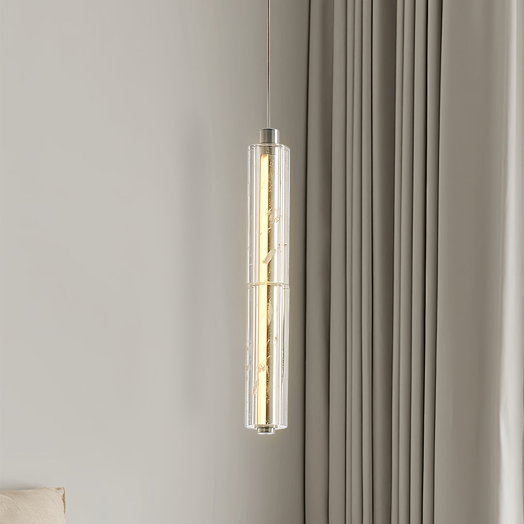 Detailed view of Aureon crystal pendant light showing crystal texture and warm light diffusion