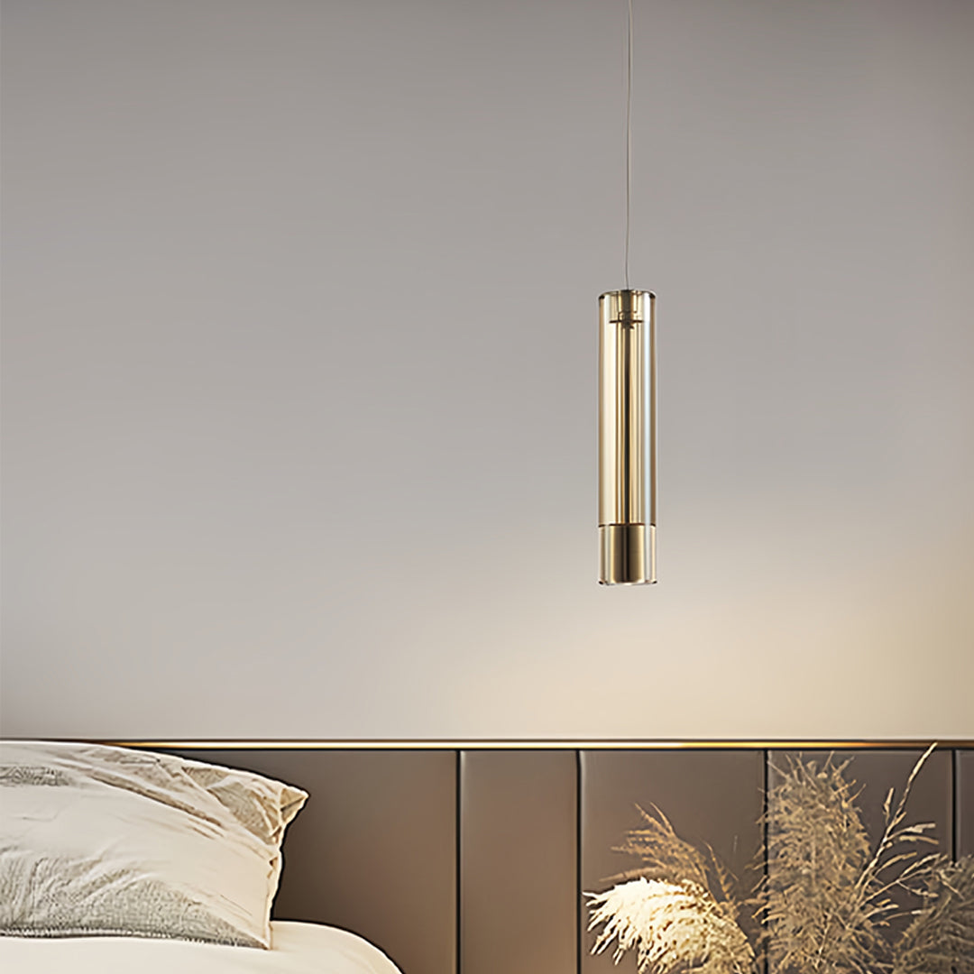 Crystal pendant lights above a bedroom headboard providing soft ambient lighting