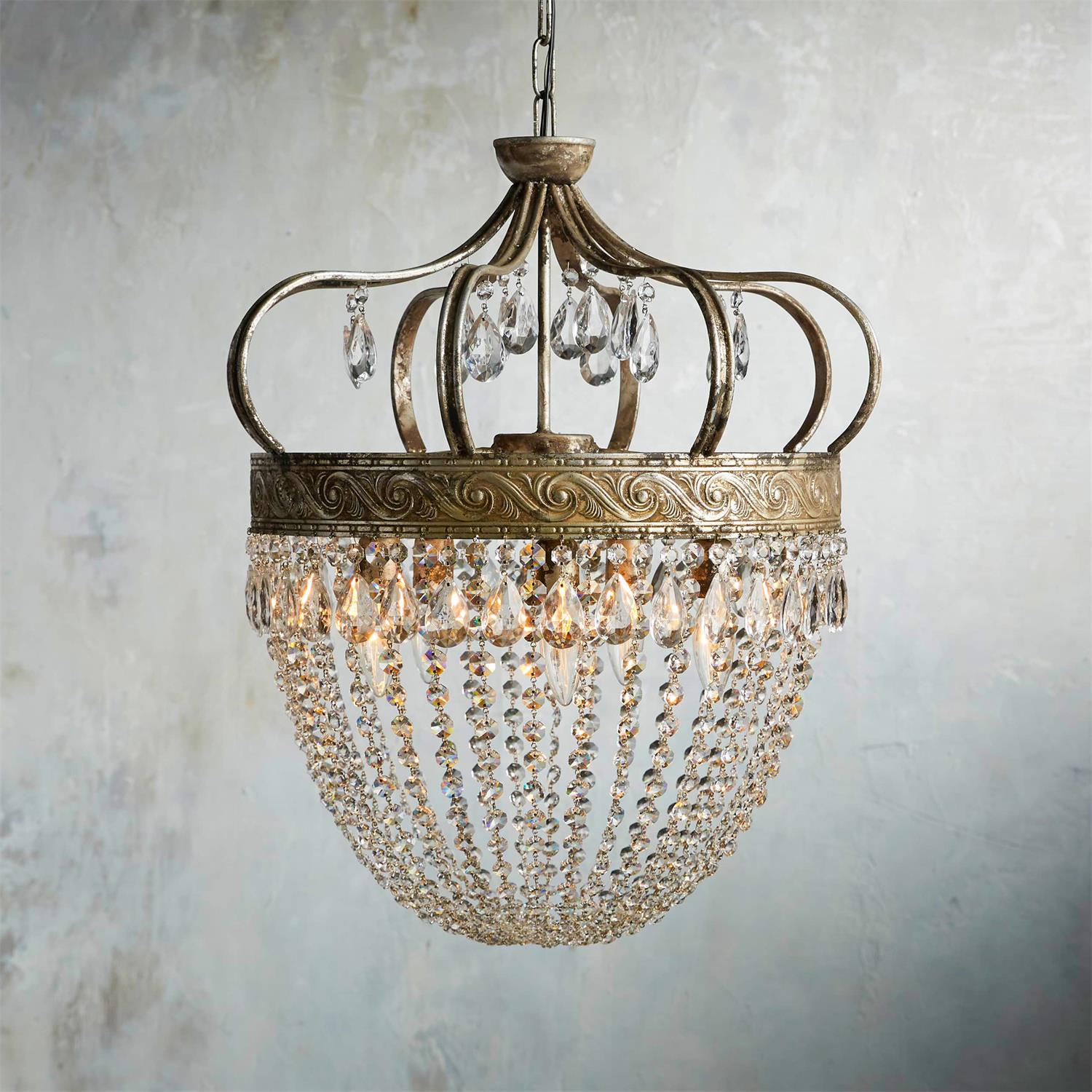 Crystal drop chandelier in antique gold finish, close-up of hand-assembled glass teardrops