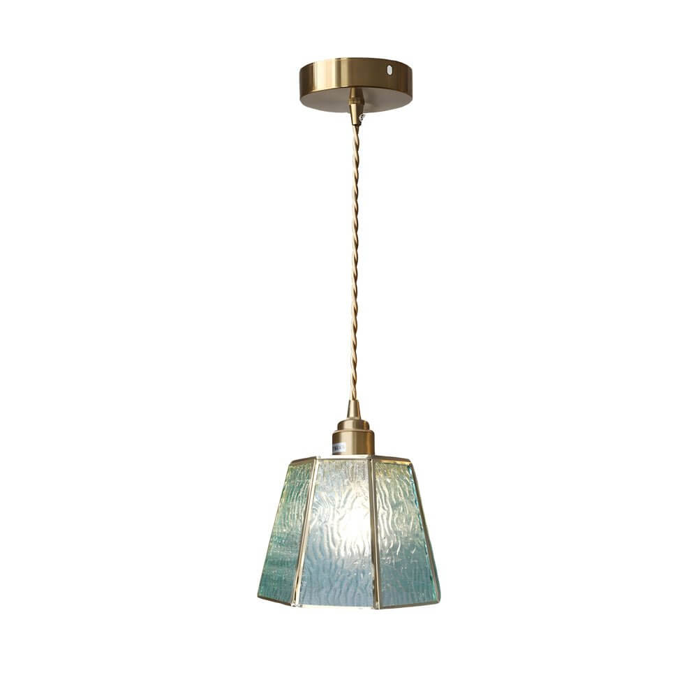 Close-up of the Aureon eight-segment textured glass shade with warm brass frame