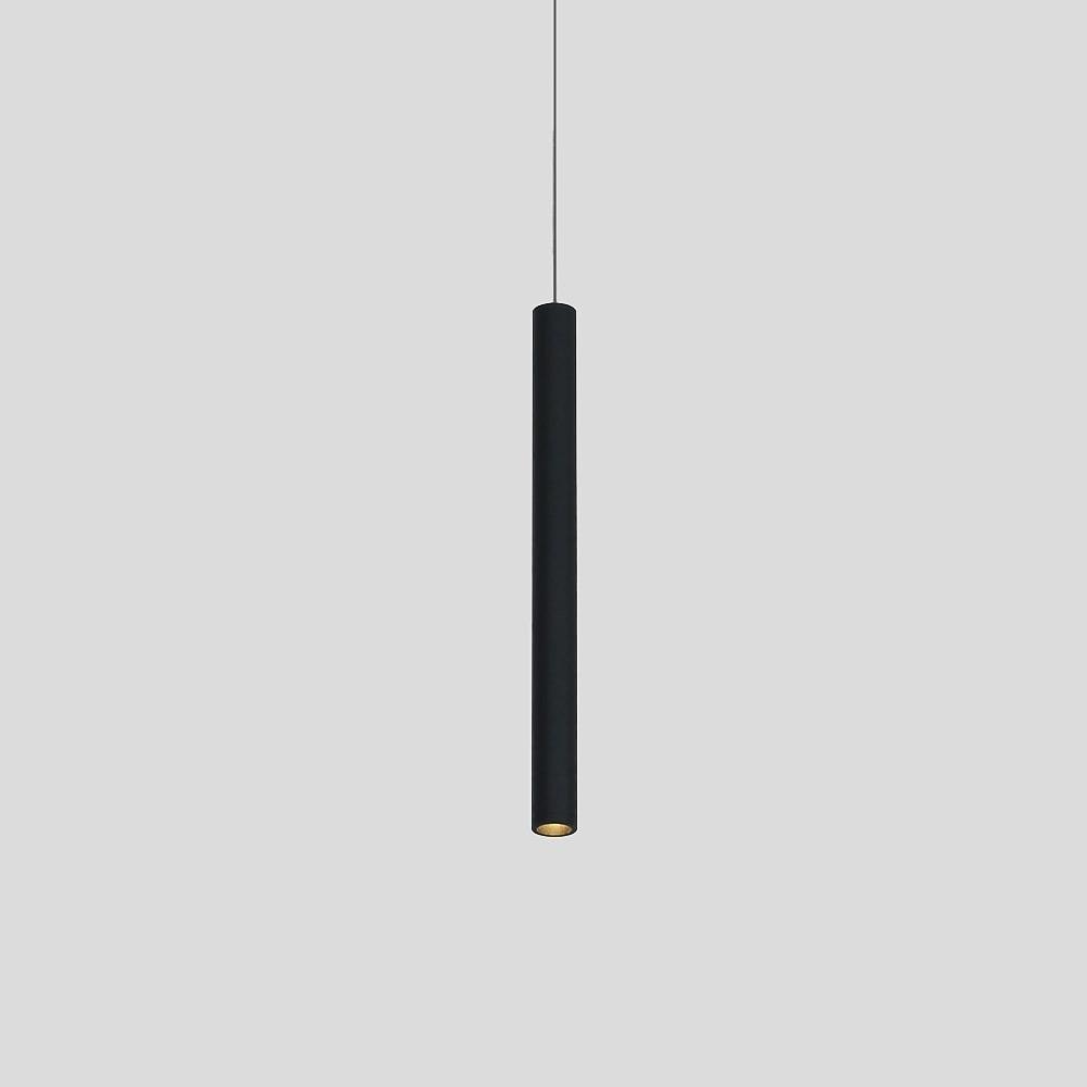 Set of Aureon black pendant lights above a kitchen island in a contemporary interior