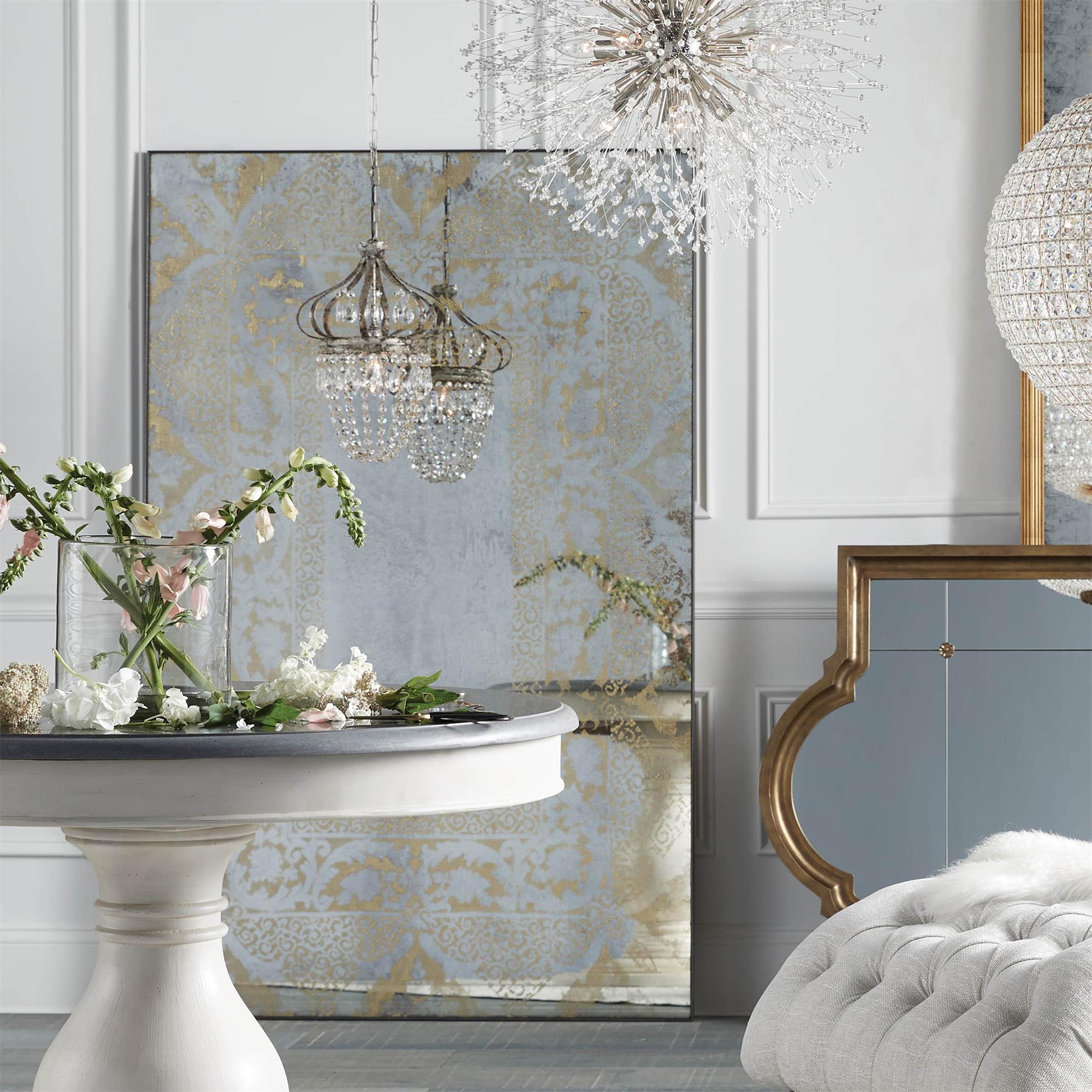 Vantara chandelier glass drops catching ambient light in a modern interior