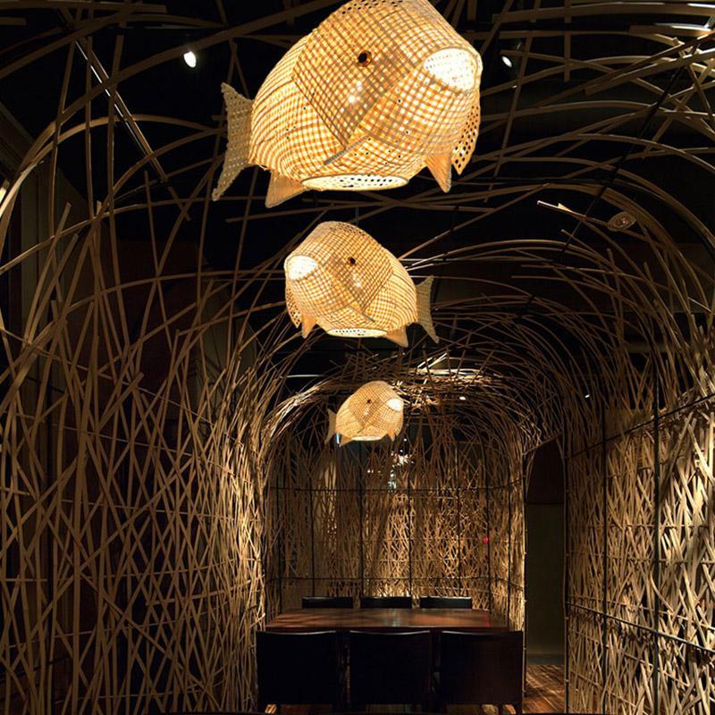 Organic modern bamboo pendant light creating ambient glow in a cosy dining area