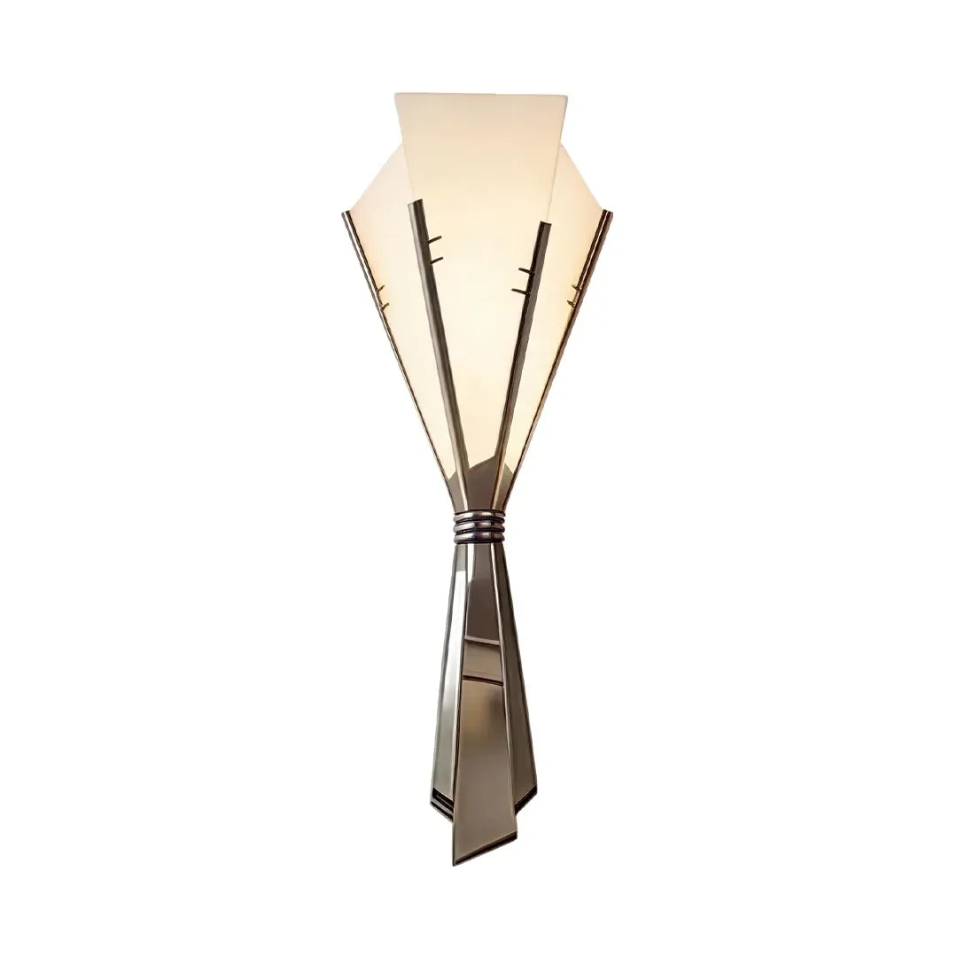 Niva wall sconce in small size, white marble shade against a neutral wall