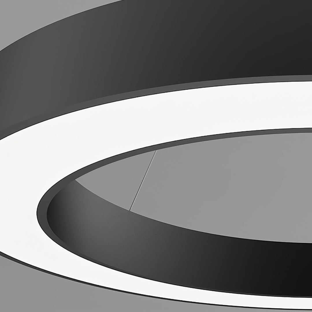 Close-up of Aureon geometric pendant light black iron frame and white frosted acrylic shade