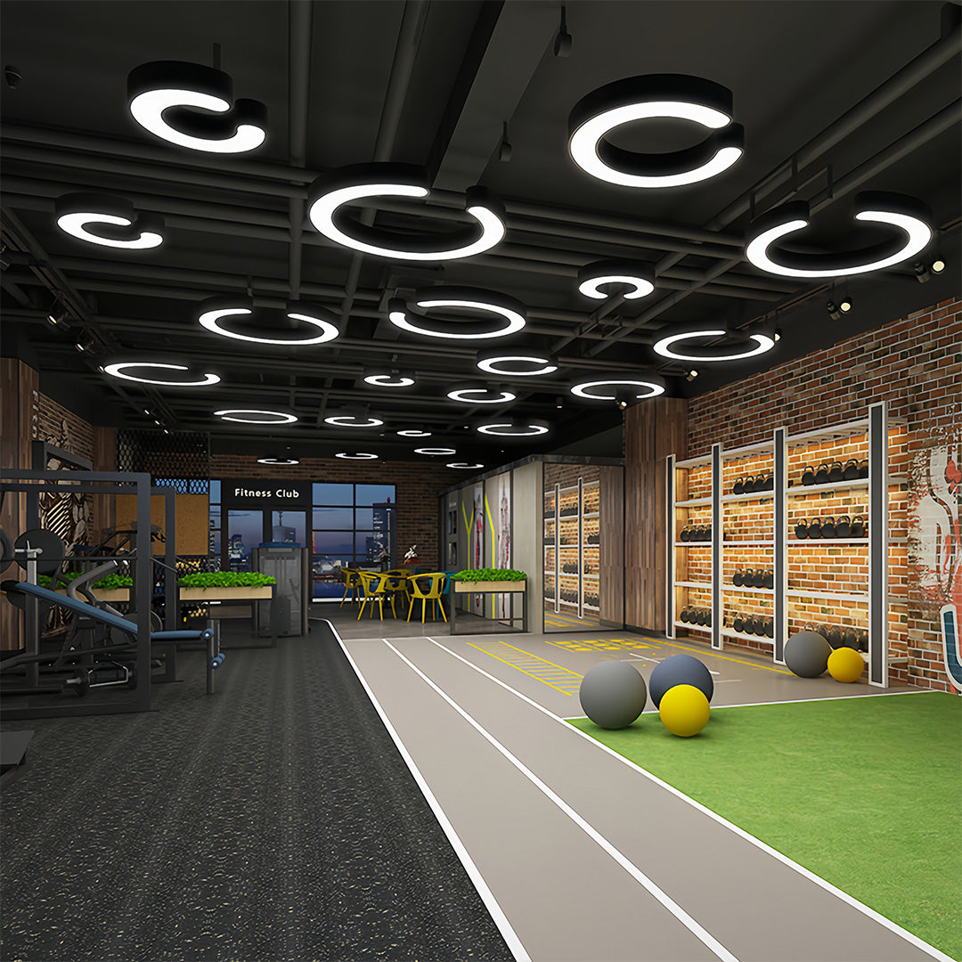 Aureon geometric pendant lights in a workspace with grass flooring and natural light