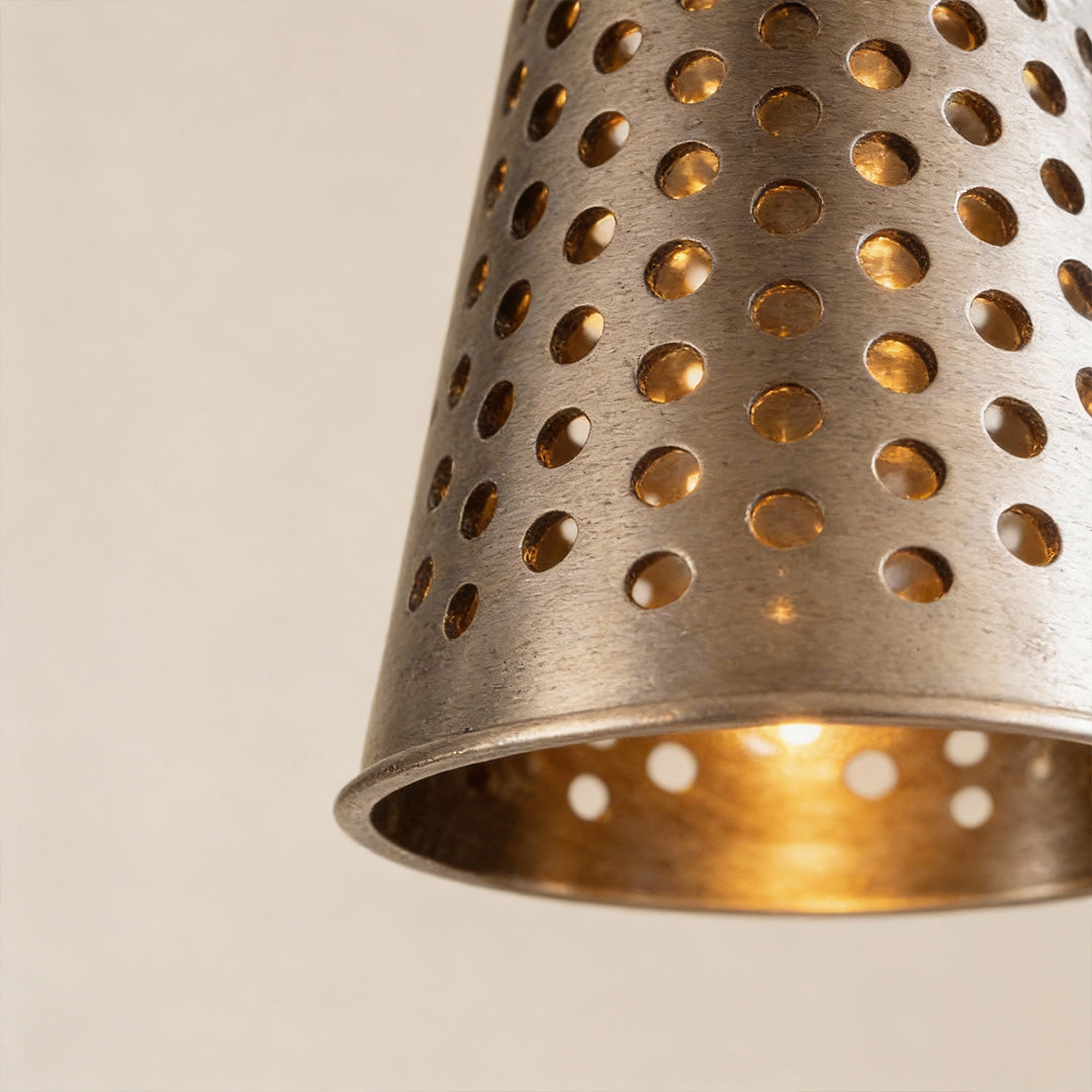 Aureon pendant light with metal perforated cone shade, brass finish ceiling pendant