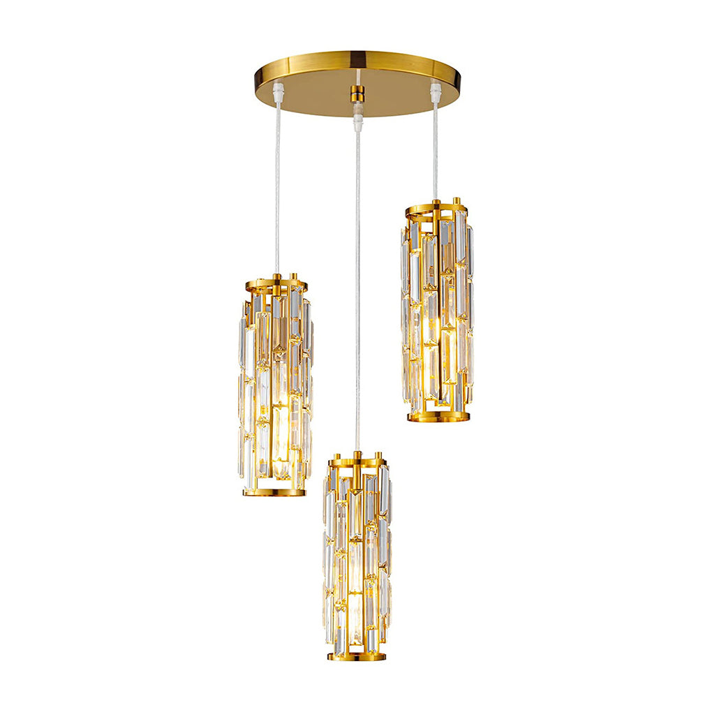 Gold 3-light crystal pendant light cluster above a kitchen or dining area