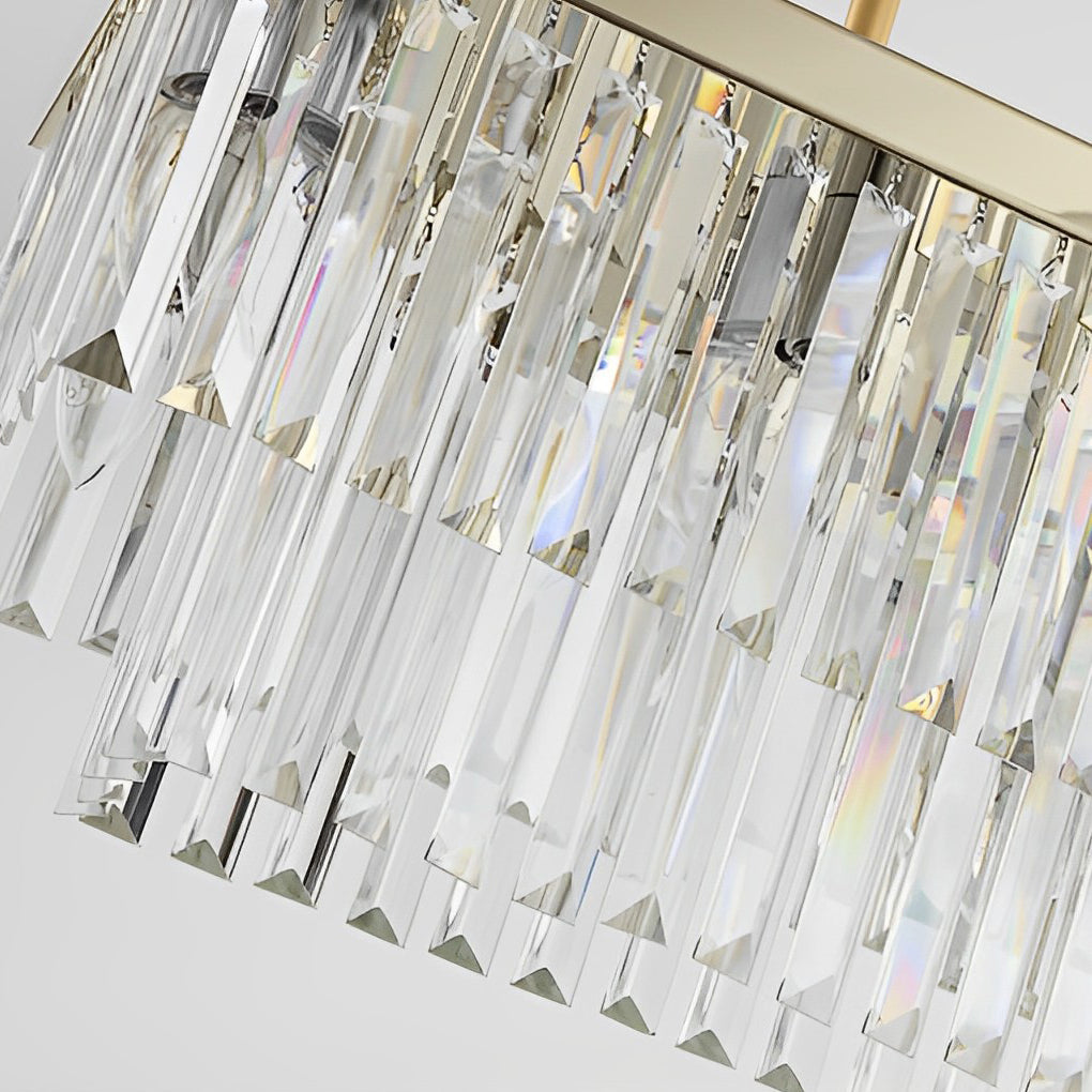 Gold rectangular crystal chandelier in a bright, modern contemporary interior