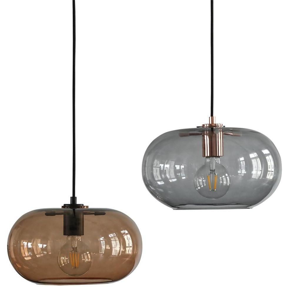 Aureon smoke gray glass pendant light in a modern kitchen island setting