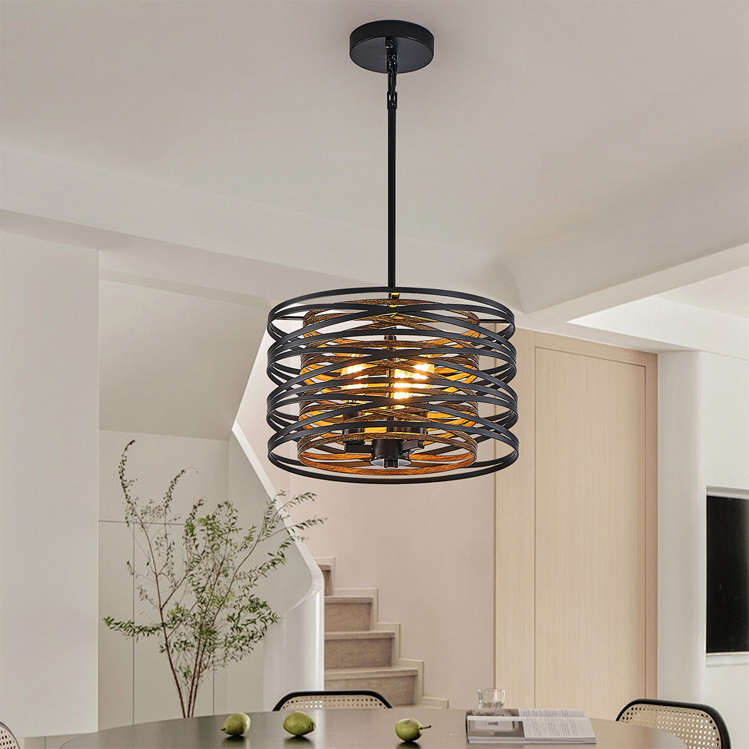 Aureon black iron pendant light positioned above a kitchen island