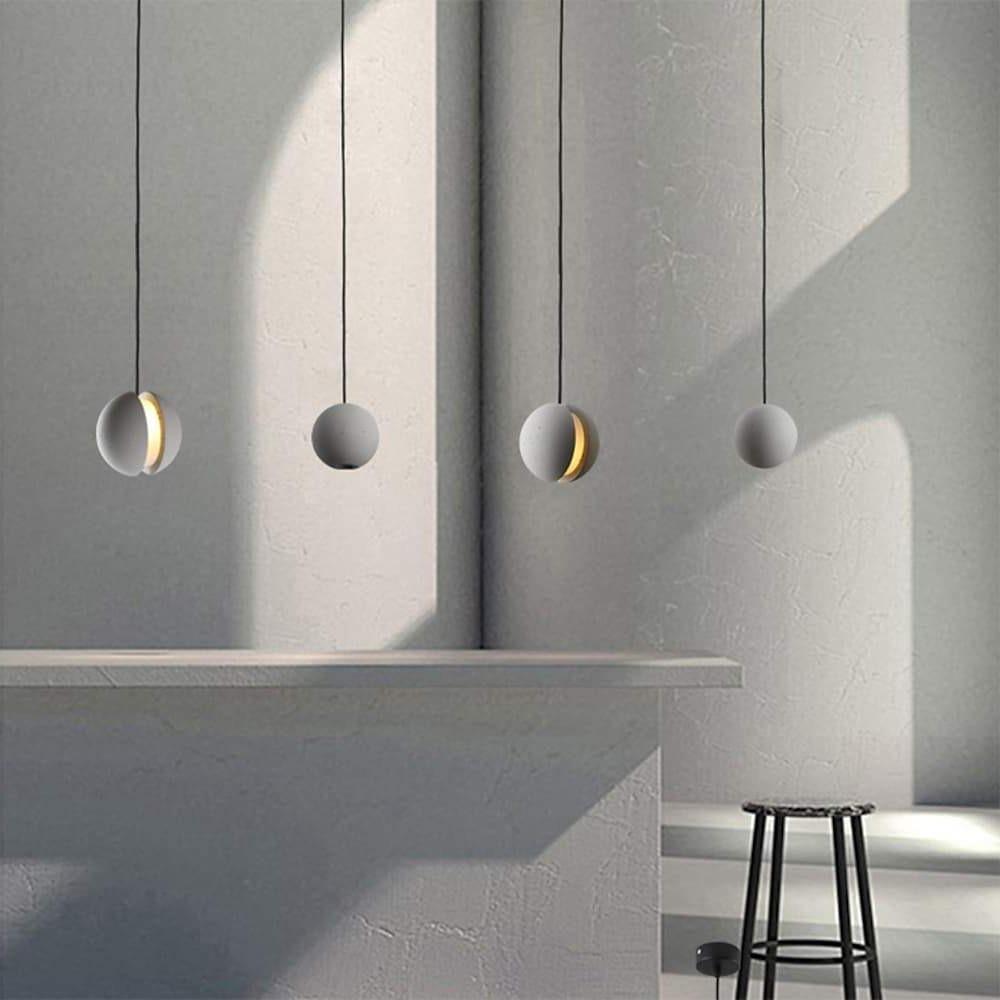 Aureon pendant light cluster arrangement in a contemporary open-plan kitchen
