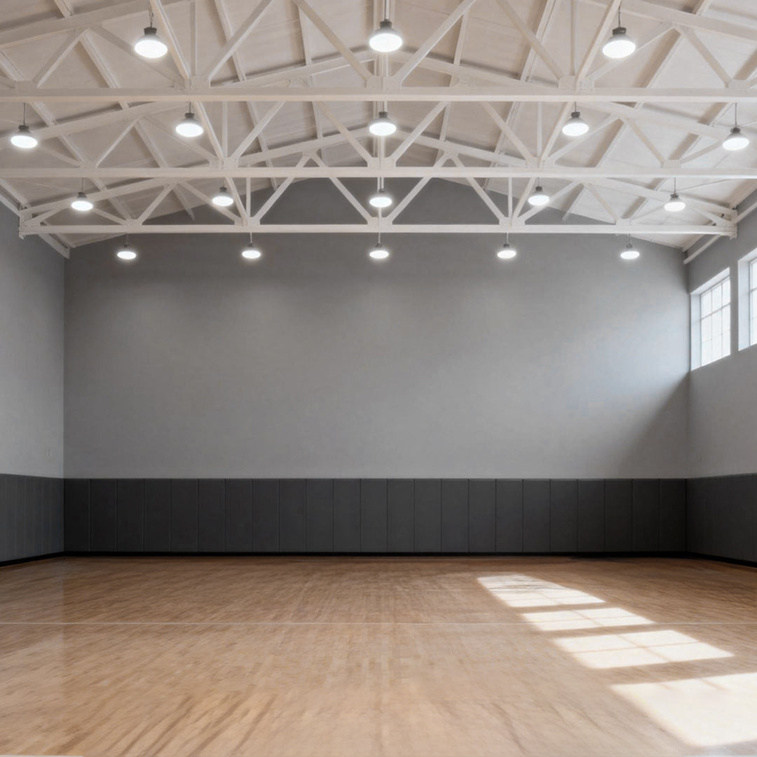 Aureon LED warehouse pendant light providing bright even illumination in an industrial facility