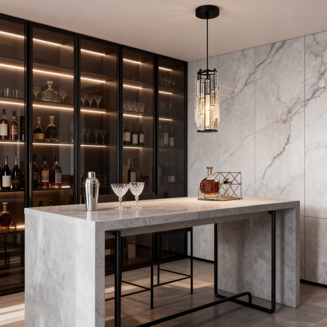Mini crystal pendant light above a marble bar area in an industrial-style space