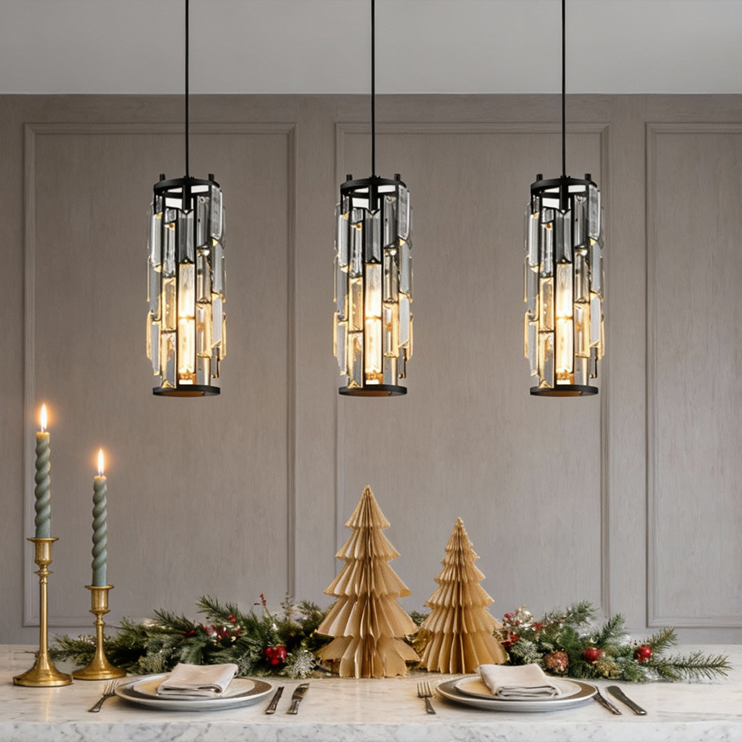 Crystal pendant lights above a set dining table in a modern dining room