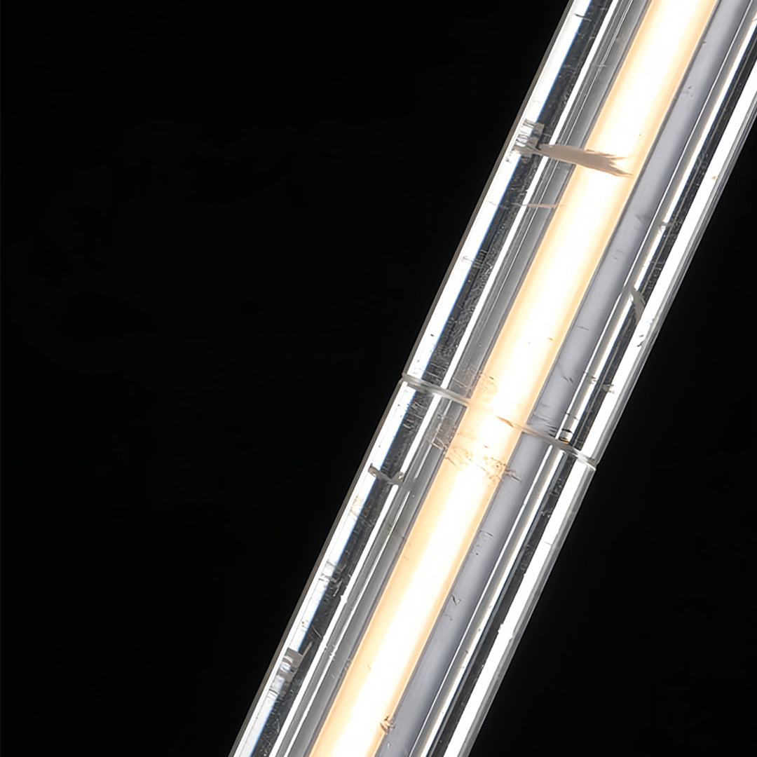 Aureon sleek cylindrical crystal pendant light in a contemporary living space
