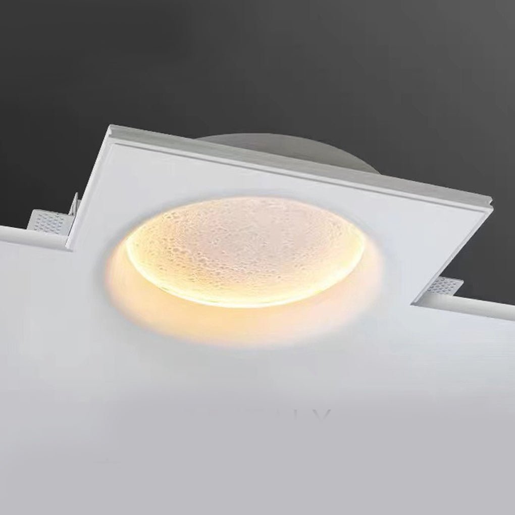 Alure 60 cm flush wall light casting warm white light across a bedroom feature wall