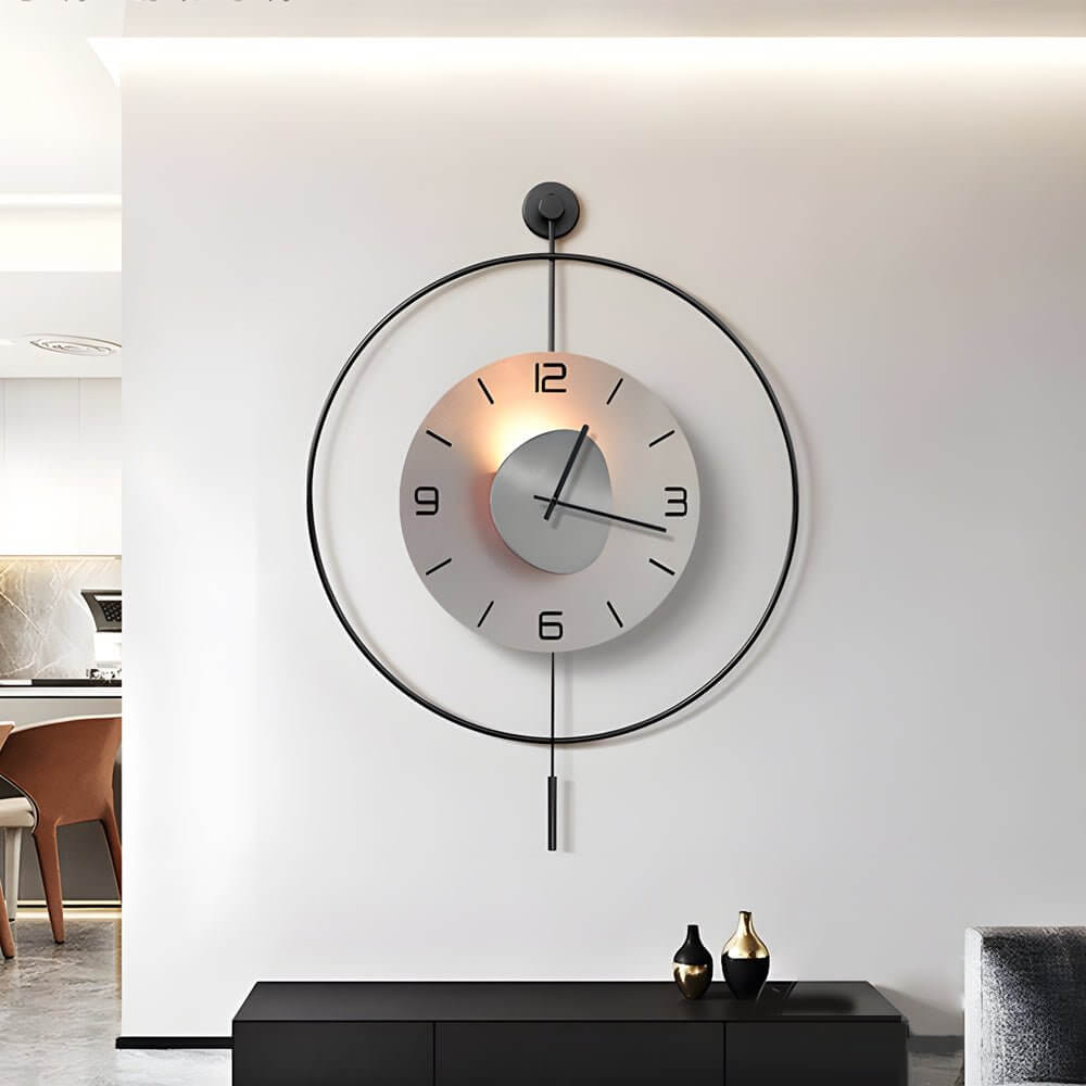 Close-up of the Alure floating aluminum clock dial with open cut-out numeral ring and bar-style hands, LED illuminated
