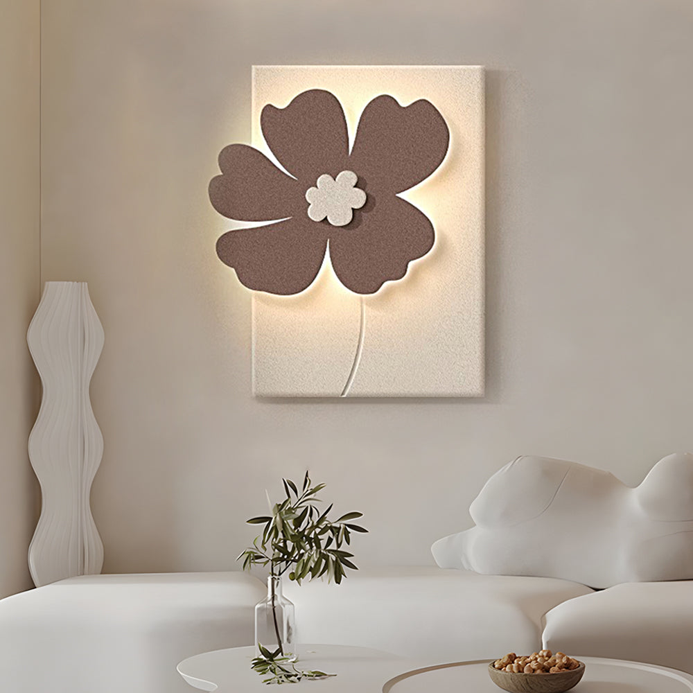 Alure brown colourway floral relief wall light mounted on a white wall