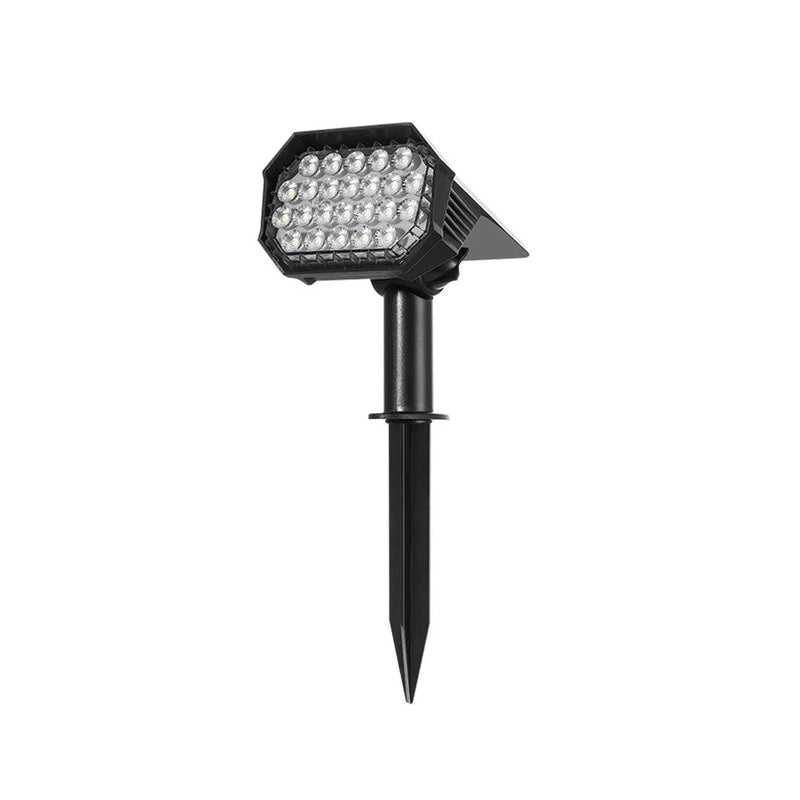Solvara solar ground stake lights set of four arranged along a garden border at dusk