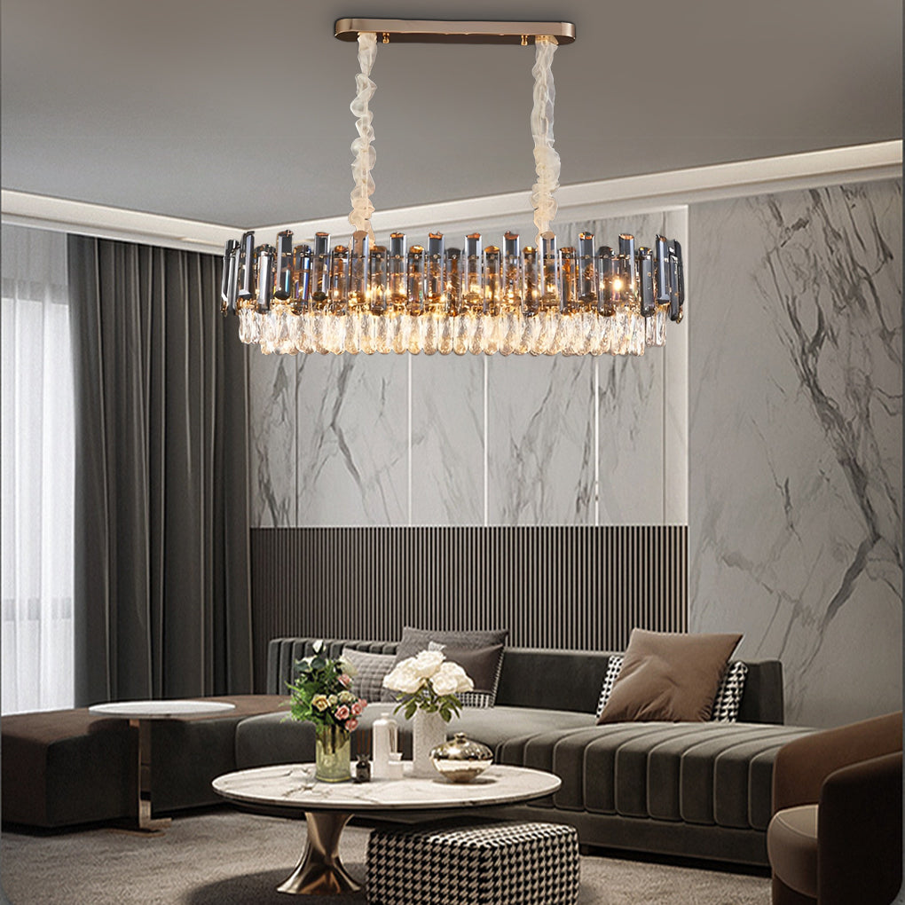 Auréline crystal drum chandelier producing a warm glow over a modern home seating area