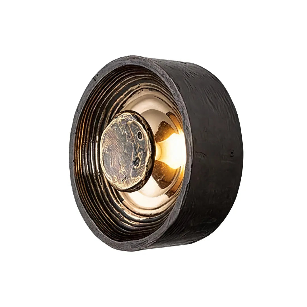 Niva black copper round wall sconce, single product view showing full silhouette