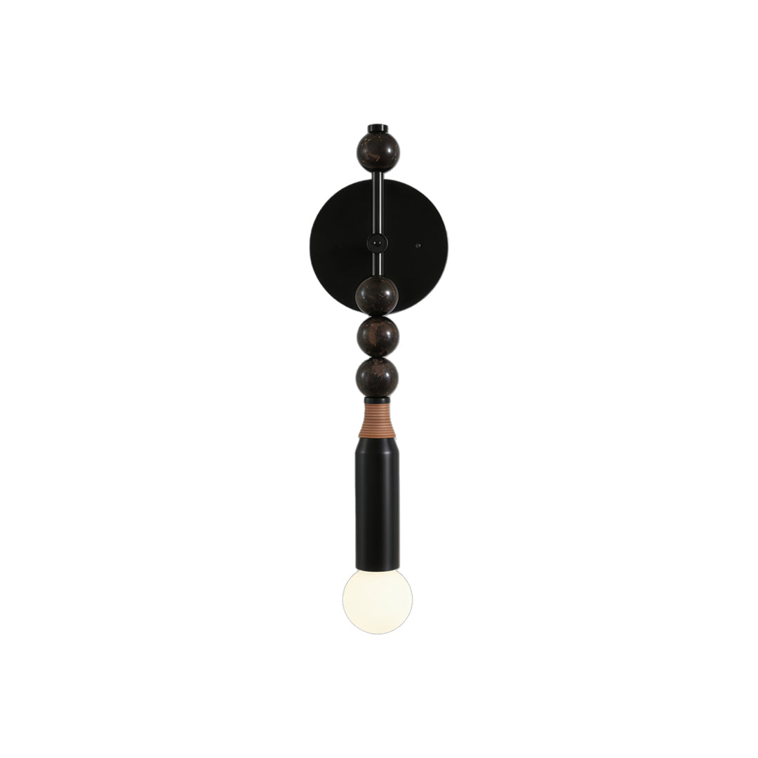 Alure globe wall light in copper and white finish, marble-effect acrylic shade on a neutral wall